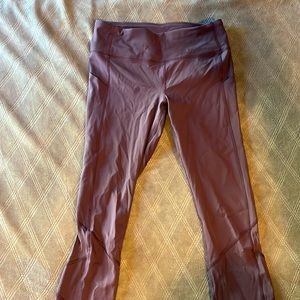 Lululemon 23”running leggings pockets on sides and zip pocket in back